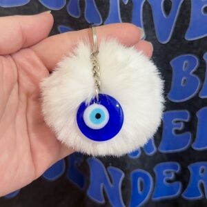 White Fur Keychain with Blue Evil Eye Charm
